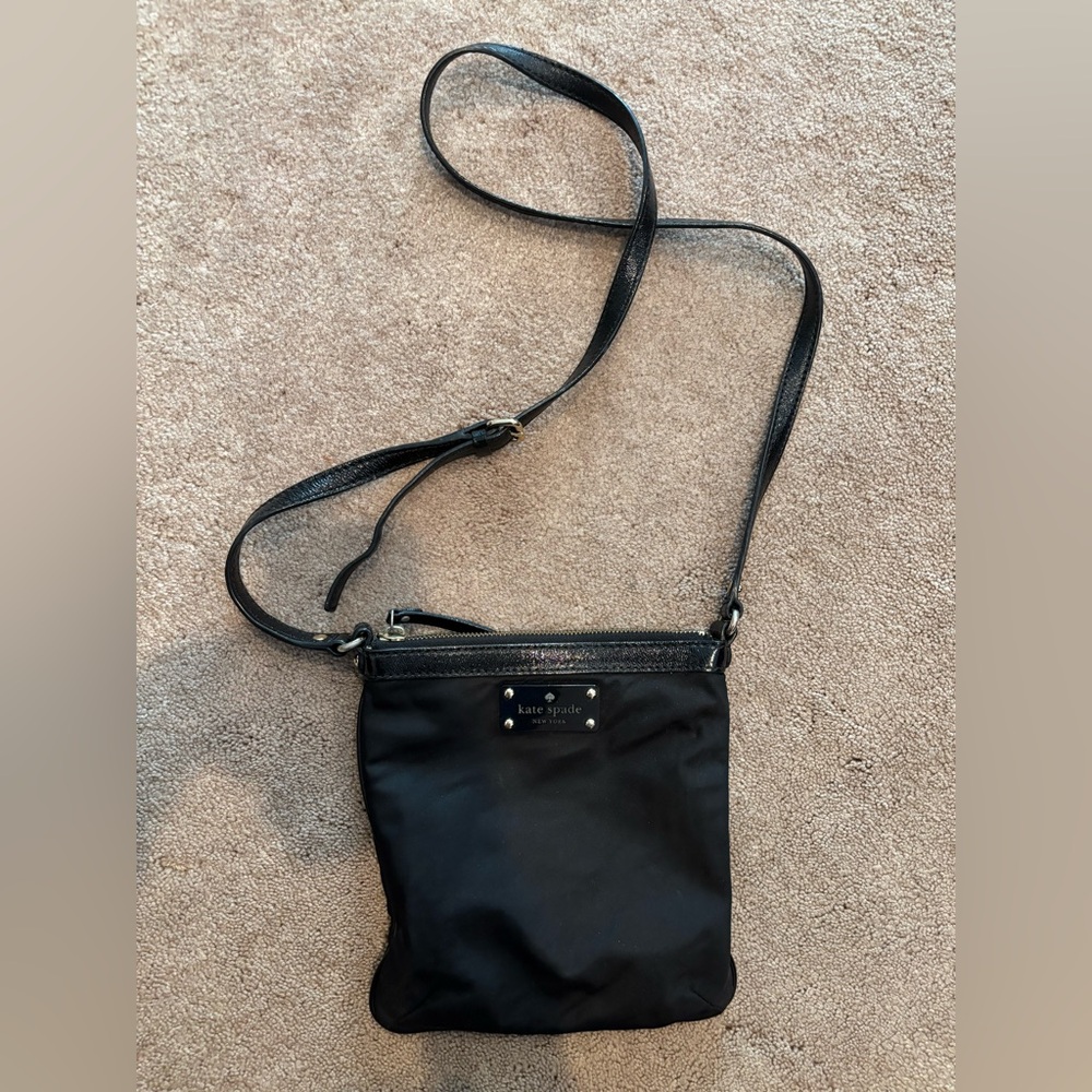 Kate Spade Black Nylon Crossbody Bag nylon with patten leather strap.